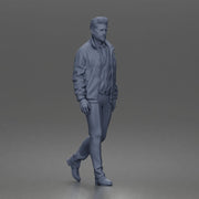 Confident businessman walking forward in formal suit with composed focused expression - Only-Games