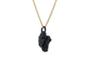 Four Eyed Monster pendant