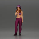 beautiful girl in pants and a hat thinking - Only-Games