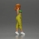 Curly-Haired Woman in Vibrant Green Outfit Striking a Pose - Only-Games