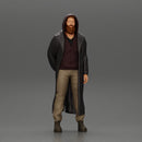 bearded man stands confidently adorned in a stylish hoodie and a flowing long coat - Only-Games