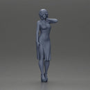 beautiful girl in a mini dress and heels with short hair places her hand on her neck - Only-Games