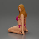 Beautiful Woman in Bikini Sitting on the Beach - Only-Games