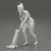 housewife makes home cleaning with a vacuum cleaner - Only-Games