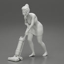 housewife makes home cleaning with a vacuum cleaner - Only-Games