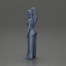 Stylish woman in a crop top and pants, standing thoughtfully - Only-Games