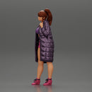 Sexy girl in shorts and long jacket standing - Only-Games