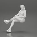 Sexy girl sitting with crossed legs  n boots and mini skirt  with long pigtails - Only-Games