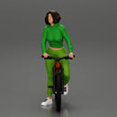 Young sexy sporty woman in pants and snickers short haired posing with bicycle - Only-Games