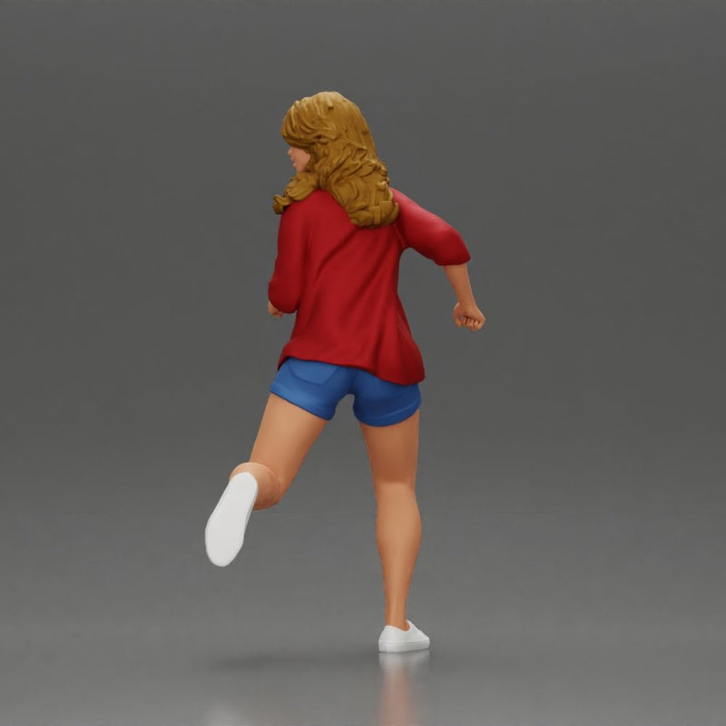 Afraid young woman running in an open shirt and shorts with a determined expression