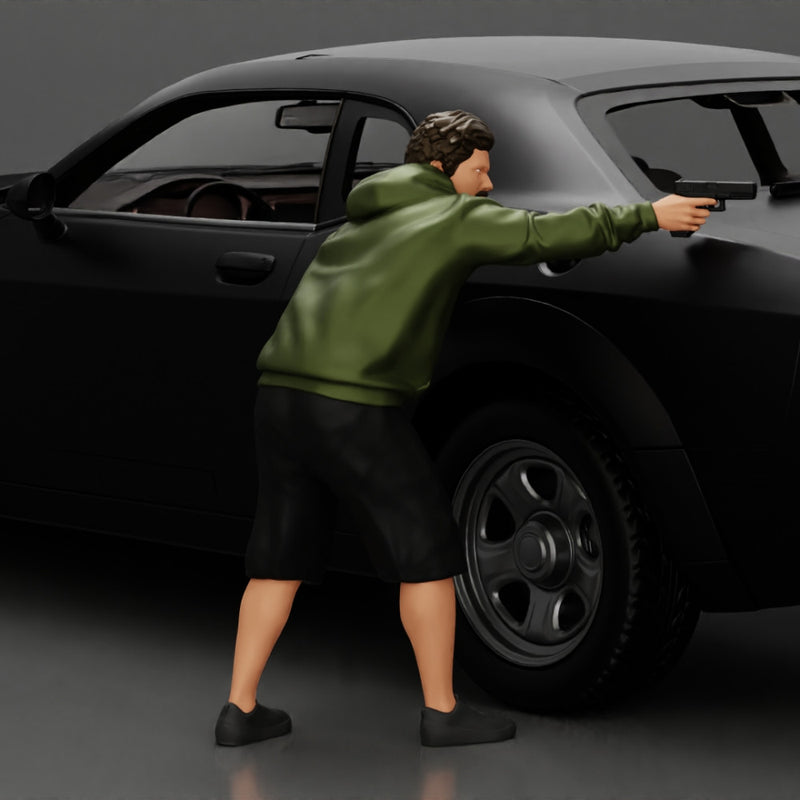 gangster man in a hoodie and shorts shooting a gun behind the car