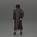 bearded man stands confidently adorned in a stylish hoodie and a flowing long coat - Only-Games