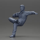 Handsome Man Smoking a Cigar and Resting One Leg on the Other - Only-Games