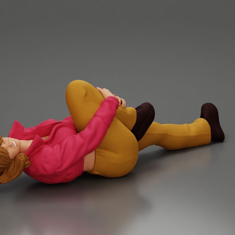 woman in mini jacket  lying on the floor touching her injured knee - Only-Games