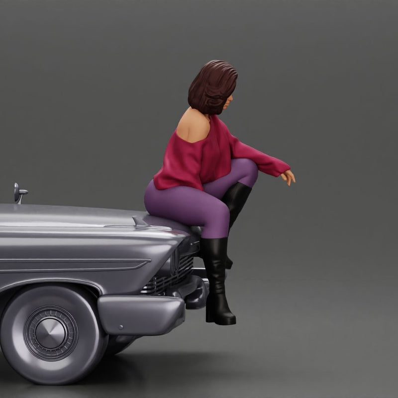 lowrider girl sitting on a car, wearing boots and a stylish shirt