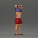 muscular man in shorts taking off his shirt to go swimming - Only-Games
