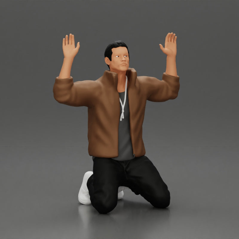 Asian gangster man in jacket sitting with his hands up ready to be arrested