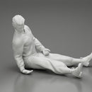 Accident of a male worker sitting on the floor with an injured - Only-Games