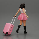 2 Young woman in sexy dress and boots pulling suitcase  walking in airport terminal - Only-Games