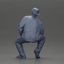 hip hop man sitting in a jacket and cap - Only-Games