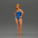 Elegant pose in blue swimsuit showcasing confidence and grace - Only-Games