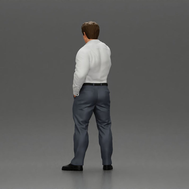 Serious businessman in a white shirt tie, and pants pointing with authority, hand in pocket