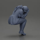 sad girl in a puff-sleeve shirt sitting and crying with her hands covering her face - Only-Games