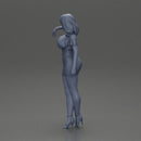 Elegant pose in vibrant blue dress with matching high heels - Only-Games