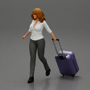 2 Business woman in shirt and trousers pulling suitcase walking in airport terminal - Only-Games
