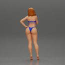 sexy girl in bikini standing smoking cigarette on the beach - Only-Games