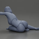 attractive girl in a bikini, lying and reclining gracefully on the beach - Only-Games