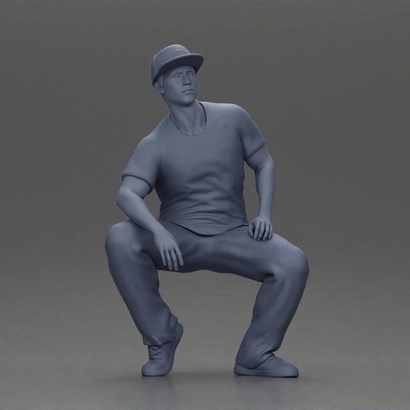 hip-hop man sitting in shirt and cap