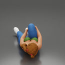 woman in bra lying on the floor touching her injured knee - Only-Games