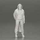 bearded man stands confidently adorned in a stylish hoodie and a flowing long coat - Only-Games