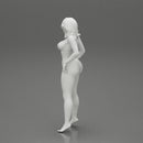 sexy girl in bikini posing standing on the beach - Only-Games