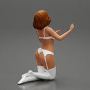 Sexy girl in bikini lingerie sitting on her knees - Only-Games