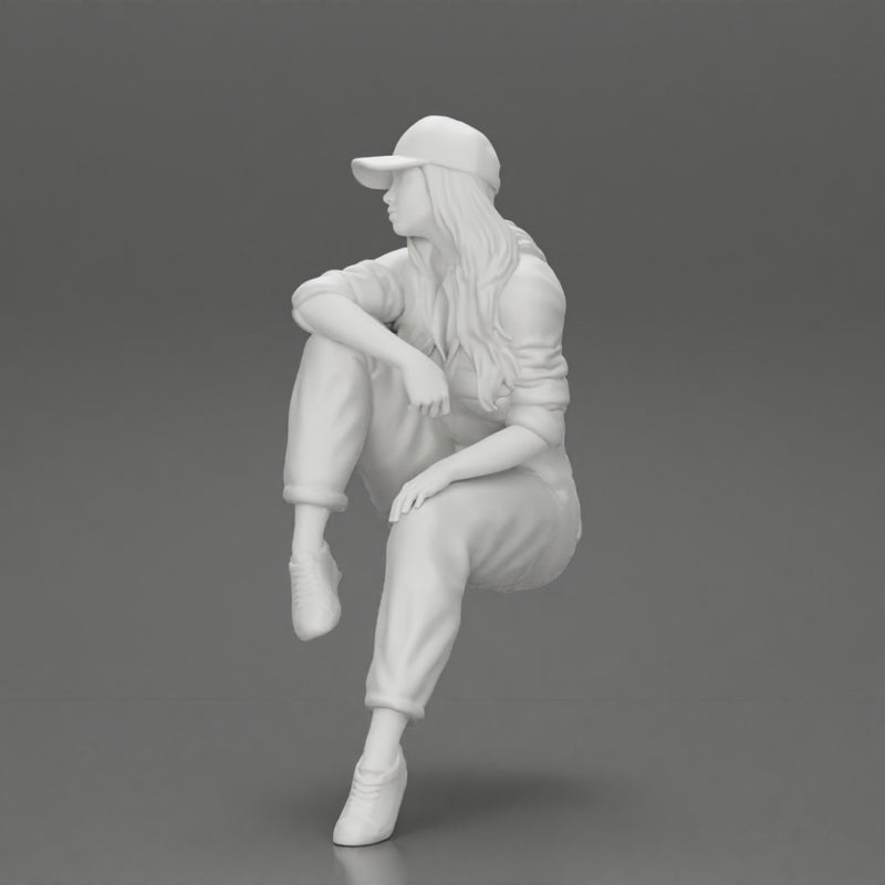 Tired woman mechanic in suit and cap sitting - Only-Games