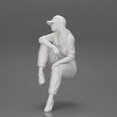 Tired woman mechanic in suit and cap sitting - Only-Games