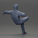 Handsome Man Smoking a Cigar and Resting One Leg on the Other - Only-Games