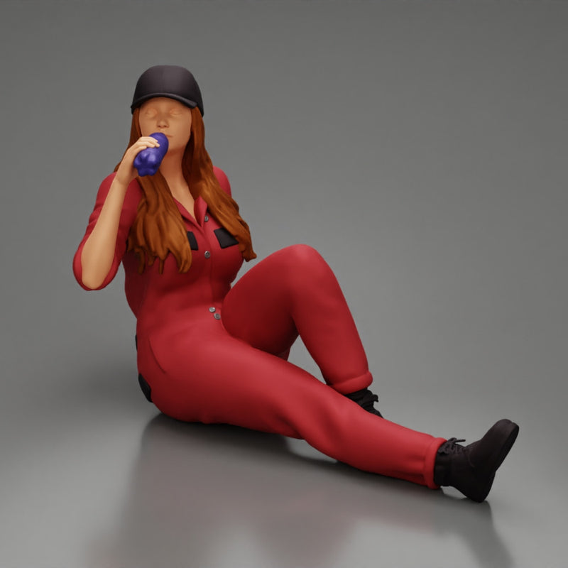Tired woman mechanic in suit and cap sitting and drinking water during from bottle - Only-Games