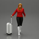 2 Fashion woman in jacket and boots dragging suitcase  walking in airport terminal - Only-Games