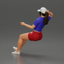 beautiful girl in cap and shorts sitting and drinking - Only-Games