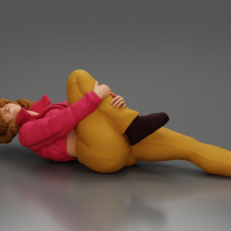 woman in mini jacket  lying on the floor touching her injured knee - Only-Games