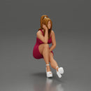 Woman in Pink Dress and heels sitting Deep in Thought - Only-Games