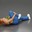 woman in bra lying on the floor touching her injured knee - Only-Games