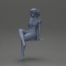 beautiful girl in dress sitting outside with her short hair blowing in the wind - Only-Games