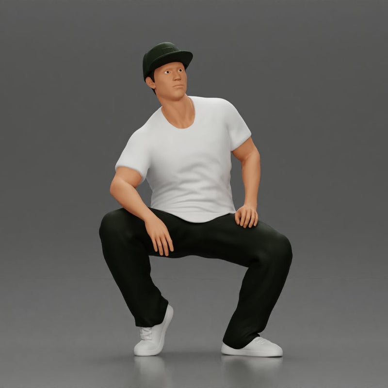 hip-hop man sitting in shirt and cap