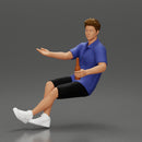 Man in shorts sitting explaining and holding a drink - Only-Games