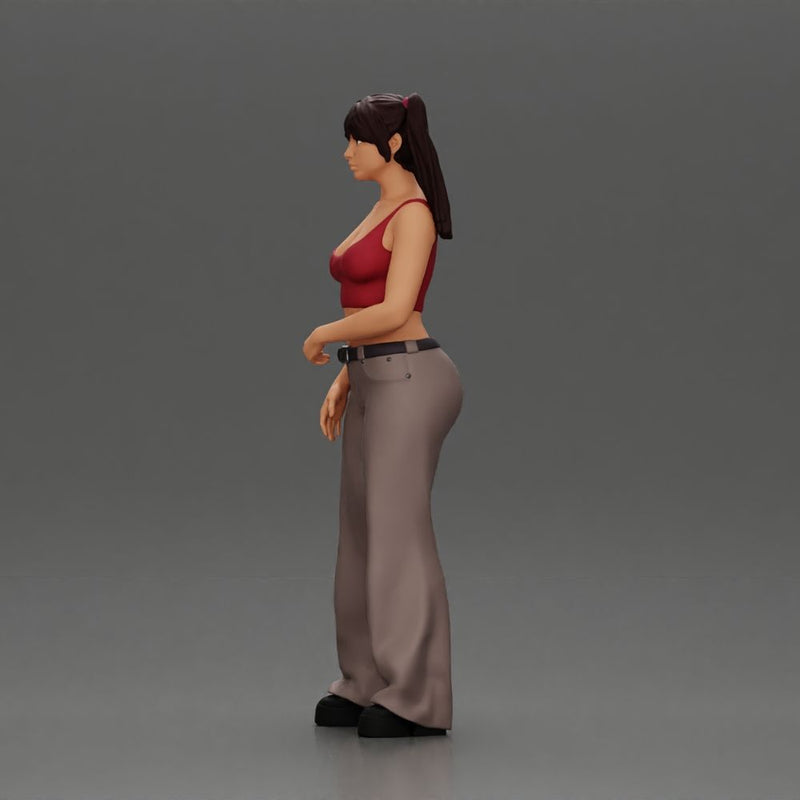 Chola girl with pigtails standing in flared pants