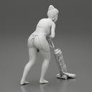 housewife makes home cleaning with a vacuum cleaner - Only-Games